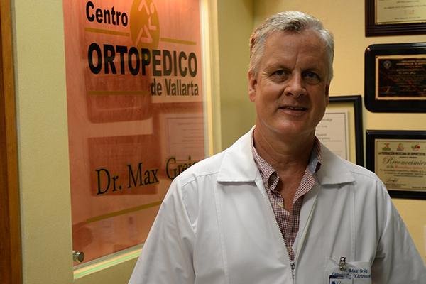 Dr. MAX GREIG